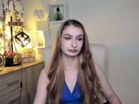 Hey, I’m Nina – blonde hair, green eyes, and tattoos that love to tell their own stories. My taste in music? Somewhere between Doja Cat’s groove and Rammstein’s fire ? I adore singing, dancing, and just vibing with the right energy. Sometimes I’m your sweet daydream, sometimes your wild rock chick – depends on which song is playing ?